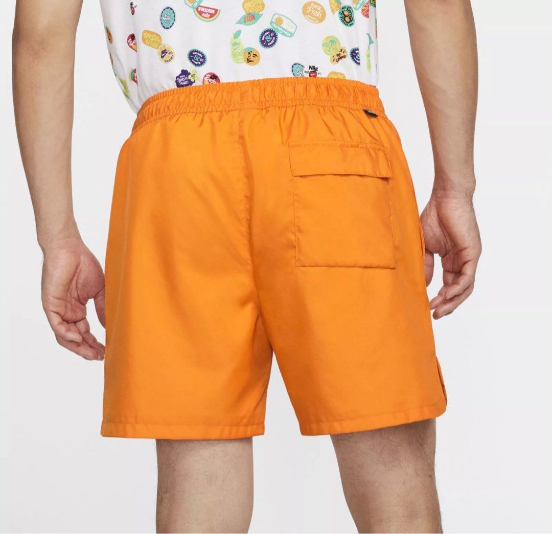 SHORTS NIKE WOVEN FLOW - LARANJA