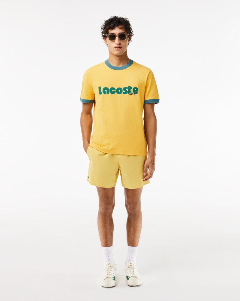 CAMISETA LACOSTE COM DETALHE CONTRASTANTE